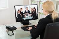 http://thumbs.dreamstime.com/b/businesswoman-video-conferencing-colleagues-computer-young-desk-office-57409675.jpg